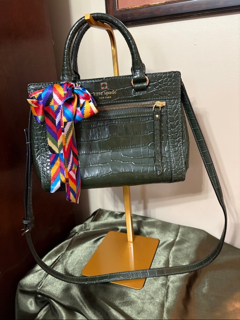 kate spade New York dark green croc-embossed leather satchel with colorful bow